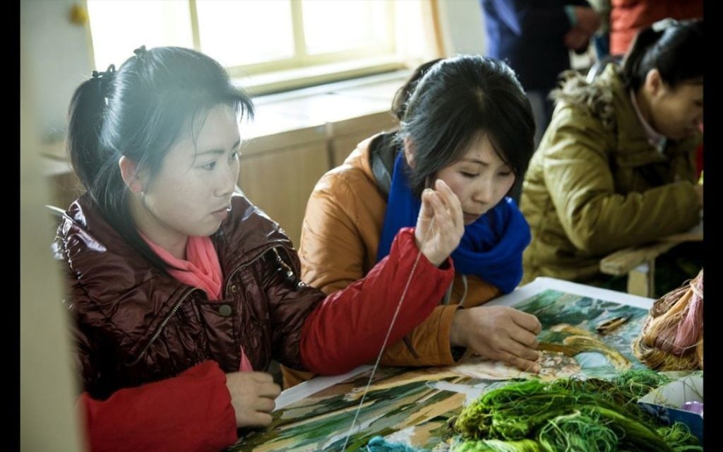 North Korean women at work. Ordinary people "simply don’t know anything. You don’t have any option in what to believe or not to believe," Shai said. (Moshe Shai)