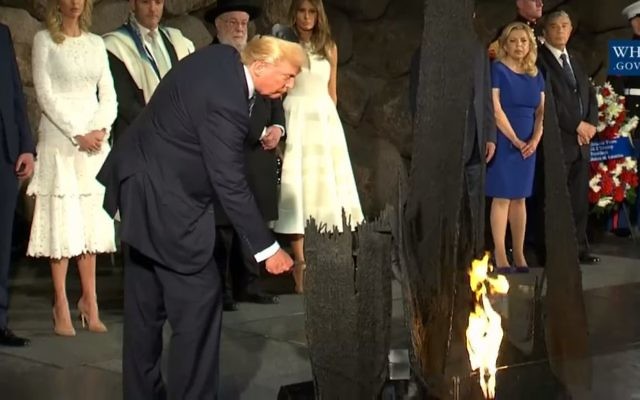 US President Donald Trump rekindles the Eternal Flame at the Yad Vashem Holocaust memorial in Jerusalem on Tuesday, May 23, 2017 (screen capture: YouTube)