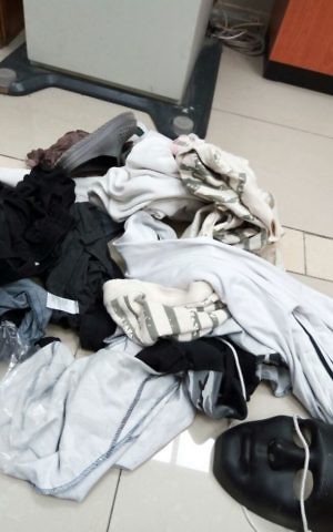 Clothing and masks that were allegedly used by rioters in East Jerusalem to disguise themselves during a violent protest against police on May 7, 2017. (Israel Police)