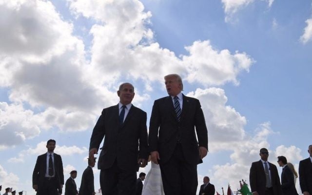 Prime Minister Benjamin Netanyahu (L) and US President Donald Trump seen at Ben Gurion International Airport prior to the latter's departure from Israel on May 23, 2017. (Koby Gideon/GPO)