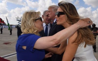First Lady Melania Trump and Sara Netanyahu embrace at Ben Gurion International Airport prior to US President Donald Trump's departure from Israel on May 23, 2017. (Koby Gideon/GPO)