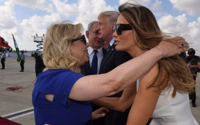 First Lady Melania Trump and Sara Netanyahu embrace at Ben Gurion International Airport prior to US President Donald Trump's departure from Israel on May 23, 2017. (Koby Gideon/GPO)