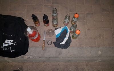 Firebomb ingredients discovered in a backpack owned by two East Jerusalem teenagers who were arrested in the Jabel Mukaber neighborhood of the capital in May 2017. (Israel Police)