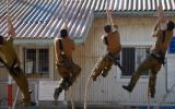 Illustrative. Soldiers climb a rope on the Israeli Navy's Haifa Base on June 19, 2013. (Israel Defense Forces)