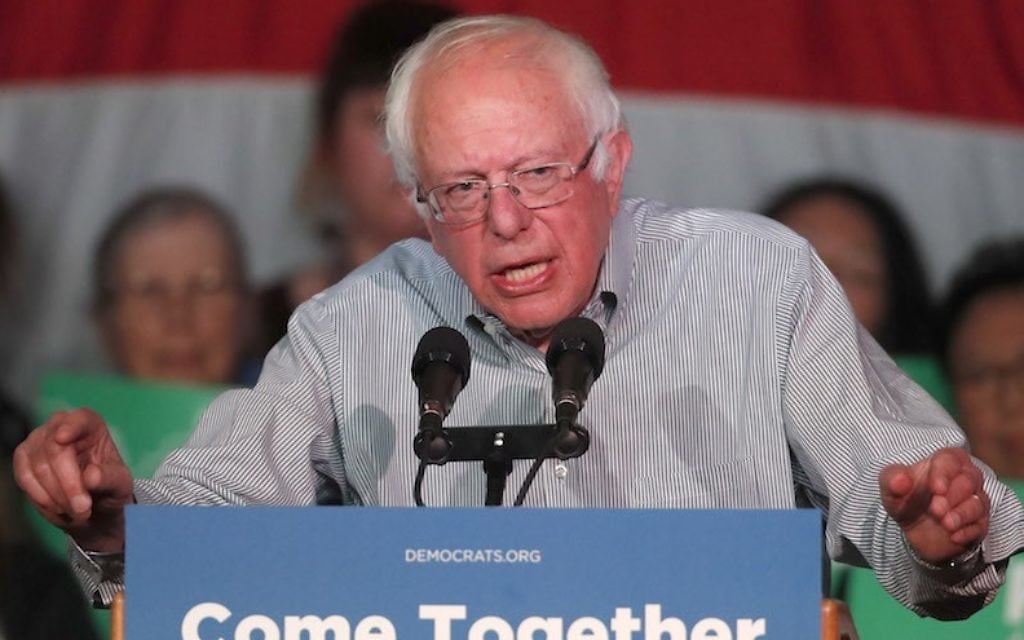 Bernie Sanders speaking to a crowd of supporters at a Democratic unity rally in Salt Lake City, Utah, April 21, 2017. (George Frey/Getty Images, via JTA) Bernie Sanders speaking to a crowd of supporters at a Democratic unity rally in Salt Lake City, Utah, April 21, 2017. (George Frey/Getty Images, via JTA)