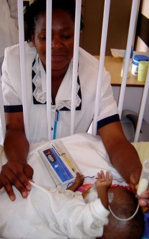 Illustrative: A doctor providing pediatric palliative care. (Public domain)