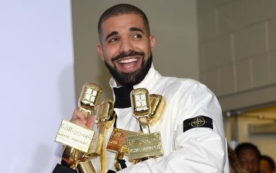 Rapper Drake poses in the press room with his 13 awards during the 2017 Billboard Music Awards at T-Mobile Arena on May 21, 2017 in Las Vegas, Nevada.  (Photo by David Becker/Getty Images via JTA)
