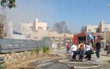 Firefighters at the scene of a blaze in which a man and a woman died in Arad, southern Israel, May 15, 2017 (Magen David Adom)
