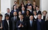 French President Emmanuel Macron (4-L) and Prime Minister Edouard Philippe (3-L) pose for a family photo after the first cabinet meeting at the Elysee Palace in Paris, France, May 18, 2017.   
/ AFP PHOTO / POOL / PHILIPPE WOJAZER