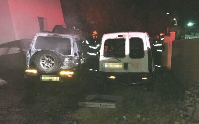 Two cars torched in a suspected Jewish hate attack in the village of 'Ara in northern Israel, May 24, 2017 (Israel Police) Two cars torched in a suspected Jewish hate attack in the village of 'Ara in northern Israel, May 24, 2017 (Israel Police)