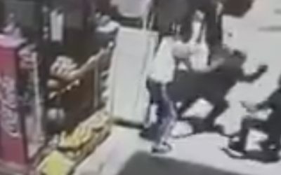 Security camera footage released by police shows the moments in which a Jordanian citizen stabbed an Israeli policeman in Jerusalem's Old City, May 13 2017 (Courtesy)