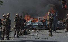 Afghan security forces personnel are seen at the site of a car bomb attack in Kabuls diplomatic quarter on May 31, 2017, in which at least 80 people were killed and 300 wounded. (AFP PHOTO / SHAH MARAI)