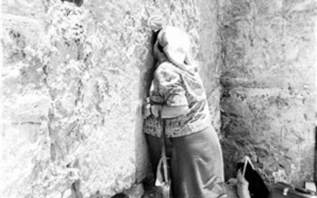 A woman prays at the Western Wall, June 22, 1967. (From the collection of Dan Hadani, National Library of Israel). A woman prays at the Western Wall, June 22, 1967. (From the collection of Dan Hadani, National Library of Israel).