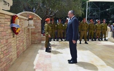 Defense Minister Avigdor Liberman seen at a Memorial Day ceremony at the Kiryat Shaul Military Cemetery in Tel Aviv on May 1, 2017. (Ariel Harmoni/Defense Ministry)