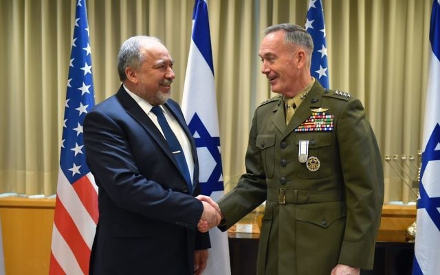 Chairman of the US Joint Chiefs of Staff Joseph Dunford, right, shakes hands with Defense Minister Avigdor Liberman in the ministry's Tel Aviv headquarters on May 9, 2017. (Ariel Hermoni/Defense Ministry) Chairman of the US Joint Chiefs of Staff Joseph Dunford, right, shakes hands with Defense Minister Avigdor Liberman in the ministry's Tel Aviv headquarters on May 9, 2017. (Ariel Hermoni/Defense Ministry)