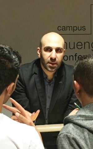 Ahmad Mansour lecturing at Campus Muengersdorf University. (Marc Neugroeschel/Times of Israel)
