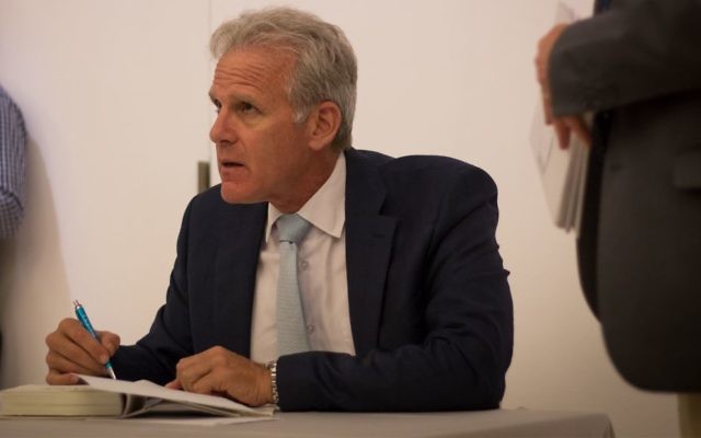 Michael Oren autographs books following a Times of Israel event in Jerusalem, May 28, 2017. (Luke Tress/Times of Israel) Michael Oren autographs books following a Times of Israel event in Jerusalem, May 28, 2017. (Luke Tress/Times of Israel)