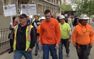 Marchers protesting labor arrangements at the Jewish Theological Seminary’s construction site in New York City say the building contractor violates workers’ rights, May 1, 2017. (Ben Sales/JTA)