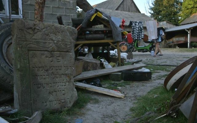 Jewish gravestone sits in Iwaniska, Poland resident's yard in 'Scandal in Ivansk' (Blumenfeld Pictures)