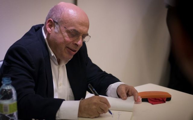 Natan Sharansky, chairman of the Jewish Agency, signs books at a Times of Israel event in Jerusalem, May 7, 2017. (Luke Tress/Times of Israel) Natan Sharansky, chairman of the Jewish Agency, signs books at a Times of Israel event in Jerusalem, May 7, 2017. (Luke Tress/Times of Israel)