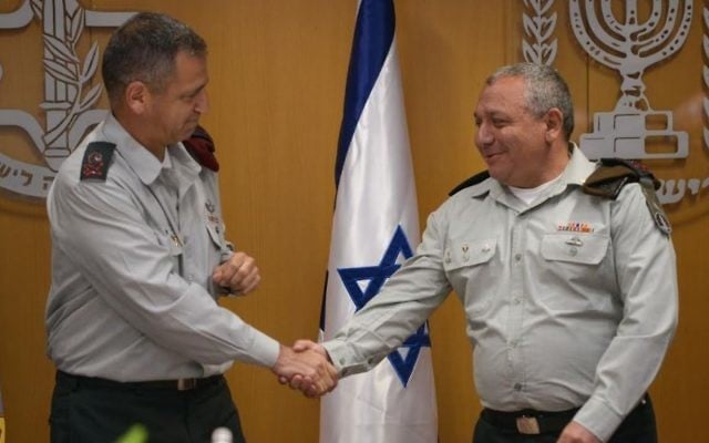 Incoming Deputy Chief of Staff Maj. Gen. Aviv Kochavi shakes hands with IDF Chief of Staff Gadi Eisenkot at a ceremony in the army's Tel Aviv headquarters on May 11, 2017. (Israel Defense Forces) Incoming Deputy Chief of Staff Maj. Gen. Aviv Kochavi shakes hands with IDF Chief of Staff Gadi Eisenkot at a ceremony in the army's Tel Aviv headquarters on May 11, 2017. (Israel Defense Forces)