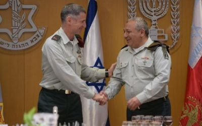 Outgoing deputy chief of staff Maj. Gen. Yair Golan, left, shakes hands with IDF Chief of Staff Gadi Eisenkot at a ceremony in the army's Tel Aviv headquarters on May 11, 2017. (Israel Defense Forces)