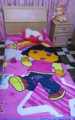 A child's bed where security forces uncovered a gun allegedly used to carry out shooting attacks on Israeli civilians and soldiers in the West Bank in April 2017. (IDF Spokesperson's Unit)