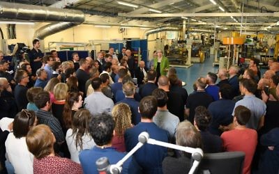 Britain's Prime Minister Theresa May at a question and answer session during a general election campaign rally at Cross Manufacturing in Bath, south-west England, May 31, 2017. (AFP Photo/Pool/Leon Neal)