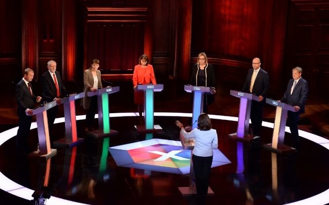 (L-R) Liberal Democrats leader Tim Farron, Labour leader Jeremy Corbyn, Green Party co-leader Caroline Lucas, Plaid Cymru leader Leanne Wood, Home Secretary Amber Rudd, UKIP leader Paul Nuttall and SNP deputy leader Angus Robertson take part in the BBC Election Debate, May 31, 2017. (AFP Photo/Pool/Stefan Rousseau)