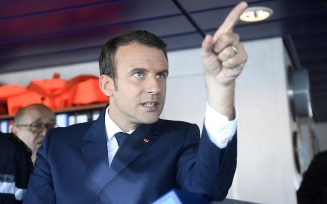 French President Emmanuel Macron gestures aboard the high seas emergency tow vessel "Abeille Bourbon", near Lorient on June 1, 2017. (AFP PHOTO / Damien MEYER) French President Emmanuel Macron gestures aboard the high seas emergency tow vessel "Abeille Bourbon", near Lorient on June 1, 2017. (AFP PHOTO / Damien MEYER)