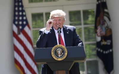 US President Donald Trump announces his decision to withdraw the US from the Paris Climate Accords in the Rose Garden of the White House in Washington, DC, on June 1, 2017. (AFP PHOTO / SAUL LOEB) US President Donald Trump announces his decision to withdraw the US from the Paris Climate Accords in the Rose Garden of the White House in Washington, DC, on June 1, 2017. (AFP PHOTO / SAUL LOEB)
