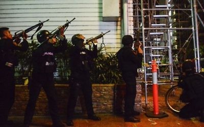 Police officers are seen outiside the Resorts World Hotel in Manila on June 2, 2017. (AFP/Ezra Acayan)