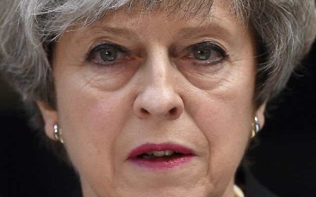 Britain's Prime Minister Theresa May delivers a statement outside 10 Downing Street in central London on June 4, 2017, following the June 3 terror attack. (AFP PHOTO / Justin TALLIS)