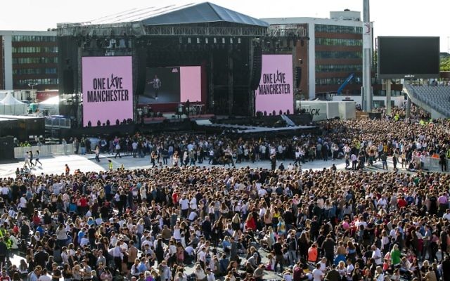 Music fans gather at the One Love Manchester benefit concert for the families of the victims of the May 22, Manchester terror attack, at Emirates Old Trafford in Greater Manchester on June 4, 2017. (AFP/Pool/Danny Lawson for One Love Manchester)