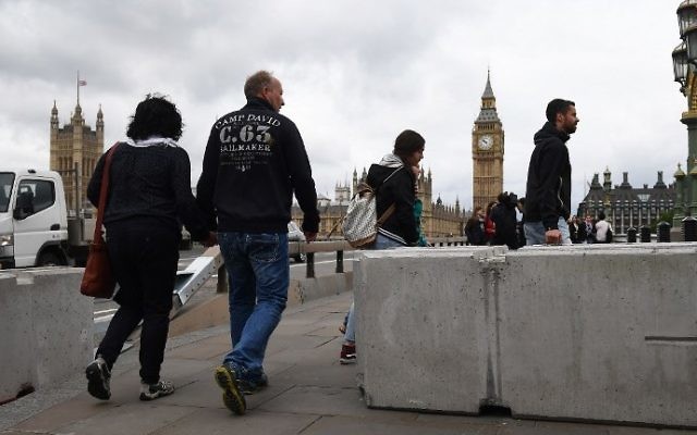A concrete barrier between the road and the sidewalk is pictured after being installed on Westminster Bridge in London on June 5, 2017, in reaction to the recent terror attacks. (AFP Photo/Justin Tallis) A concrete barrier between the road and the sidewalk is pictured after being installed on Westminster Bridge in London on June 5, 2017, in reaction to the recent terror attacks. (AFP Photo/Justin Tallis)