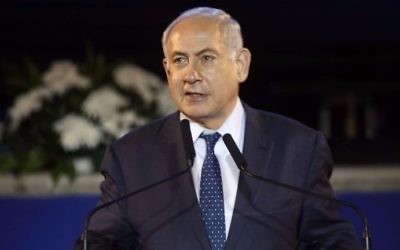 Prime Minister Benjamin Netanyahu delivers a speech during a ceremony marking the 50th anniversary of the Six Day War at the Latrun Armored Corps Memorial Site and Museum, between Jerusalem and Tel Aviv, on June 5 2017. (MENAHEM KAHANA / AFP)