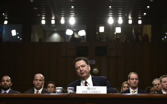 Former FBI director James Comey testifies during a US Senate Select Committee on Intelligence hearing on Capitol Hill in Washington, DC, June 8, 2017. (AFP/Brendan Smialowski)