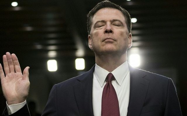 Former FBI director James Comey is sworn in during a hearing before the Senate Select Committee on Intelligence on Capitol Hill June 8, 2017 in Washington, DC. (Brendan Smialowski/AFP) Former FBI director James Comey is sworn in during a hearing before the Senate Select Committee on Intelligence on Capitol Hill June 8, 2017 in Washington, DC. (Brendan Smialowski/AFP)