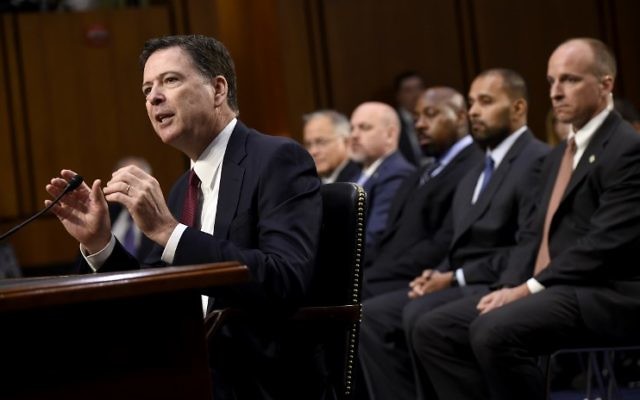 Former FBI Director James Comey testifies before the US Senate Select Committee on Intelligence hearing on Capitol Hill in Washington, DC, June 8, 2017. / AFP PHOTO / SAUL LOEB