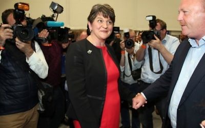 Democratic Unionist Party (DUP) leader Arlene Foster arrives at the counting centre in Belfast, Northern Ireland, early in the morning of June 9, 2017, after the polls closed in Britain's general election. (AFP/ Paul FAITH)