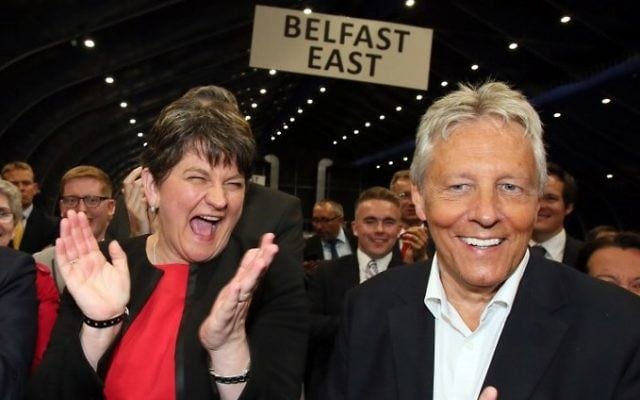 Democratic Unionist Party (DUP) leader Arlene Foster, left, celebrates with Former Democratic Unionist Party (DUP) Leader, Peter Robinson (R) at the counting centre in Belfast, Northern Ireland, early in the morning of June 9, 2017, hours after the polls closed in Britain's general election. (AFP / Paul FAITH) Democratic Unionist Party (DUP) leader Arlene Foster, left, celebrates with Former Democratic Unionist Party (DUP) Leader, Peter Robinson (R) at the counting centre in Belfast, Northern Ireland, early in the morning of June 9, 2017, hours after the polls closed in Britain's general election. (AFP / Paul FAITH)