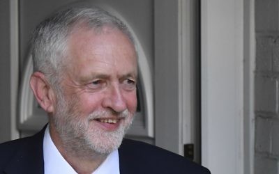 Britain's opposition Labour party Leader Jeremy Corbyn reacts as he leaves his home in north London on June 9, 2017 after results in a snap general election suggest a hung parliament eliminating the Conservative majority (AFP PHOTO / Ben STANSALL)
