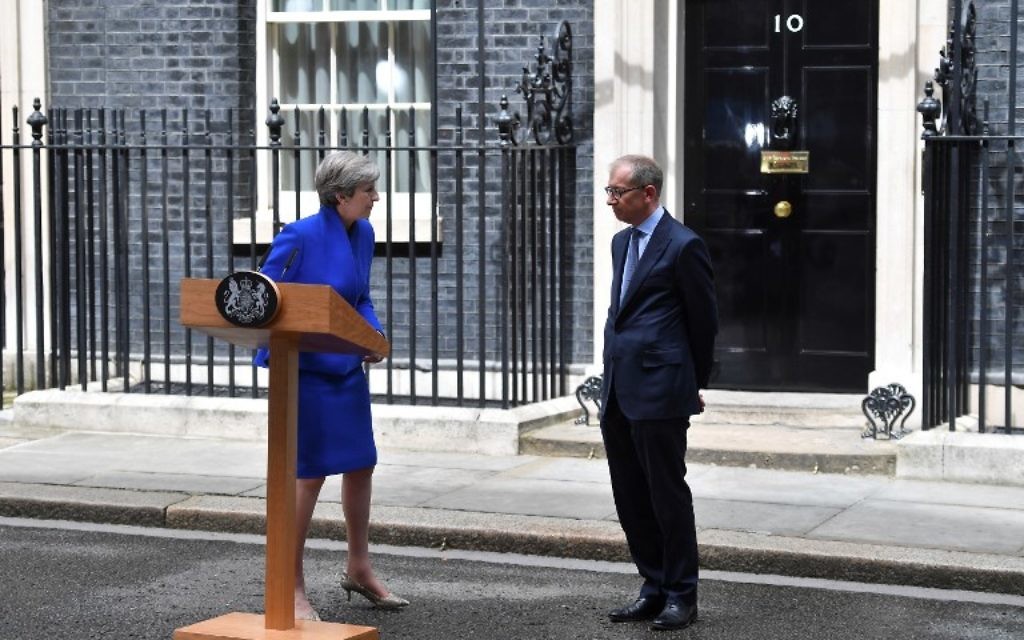 Britain's Prime Minister Theresa May, accompanied by her husband Philip, leaves after delivering a statement outside 10 Downing Street in central London on June 9, 2017 as results from a snap general election show the Conservatives have lost their majority. (AFP PHOTO / Ben STANSALL) Britain's Prime Minister Theresa May, accompanied by her husband Philip, leaves after delivering a statement outside 10 Downing Street in central London on June 9, 2017 as results from a snap general election show the Conservatives have lost their majority. (AFP PHOTO / Ben STANSALL)