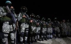 Fighters from the Izz-a-Din al-Qassam Brigades, the armed wing of the Palestinian Hamas terror group, attend a memorial service for a commander killed in an apparently accidental explosion in the southern Gaza Strip on June 10, 2017. (AFP/Said Khatib)