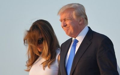 US President Donald Trump (R), and first lady Melania Trump walk off Air Force One after arriving at Andrews Airforce base, Maryland on June 11 2017. (Mandel Ngan/AFP) US President Donald Trump (R), and first lady Melania Trump walk off Air Force One after arriving at Andrews Airforce base, Maryland on June 11 2017. (Mandel Ngan/AFP)