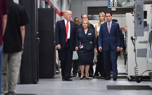 US President Donald Trump (L) tours Waukesha County Technical College with his daughter Ivanka (2nd R) during his visit in Milwaukee, Wisconsin on June 13, 2017 (AFP PHOTO / Nicholas Kamm) US President Donald Trump (L) tours Waukesha County Technical College with his daughter Ivanka (2nd R) during his visit in Milwaukee, Wisconsin on June 13, 2017 (AFP PHOTO / Nicholas Kamm)