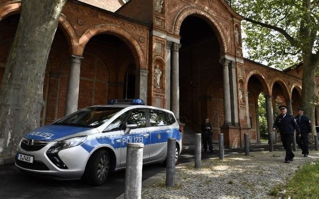 A police car is parked in front of the St. Johannis Protestant church which houses the Ibn Rushd-Goethe-mosque in Berlin on June 16, 2017. (AFP/ John MACDOUGALL)