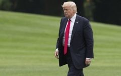 US President Donald Trump walks from Marine One upon arrival on the South Lawn of the White House in Washington, DC, June 16, 2017, following a trip to Miami, Florida where he announced his policy toward Cuba. (AFP PHOTO / SAUL LOEB)