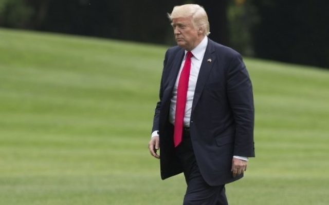 US President Donald Trump walks from Marine One upon arrival on the South Lawn of the White House in Washington, DC, June 16, 2017, following a trip to Miami, Florida where he announced his policy toward Cuba. (AFP PHOTO / SAUL LOEB) US President Donald Trump walks from Marine One upon arrival on the South Lawn of the White House in Washington, DC, June 16, 2017, following a trip to Miami, Florida where he announced his policy toward Cuba. (AFP PHOTO / SAUL LOEB)