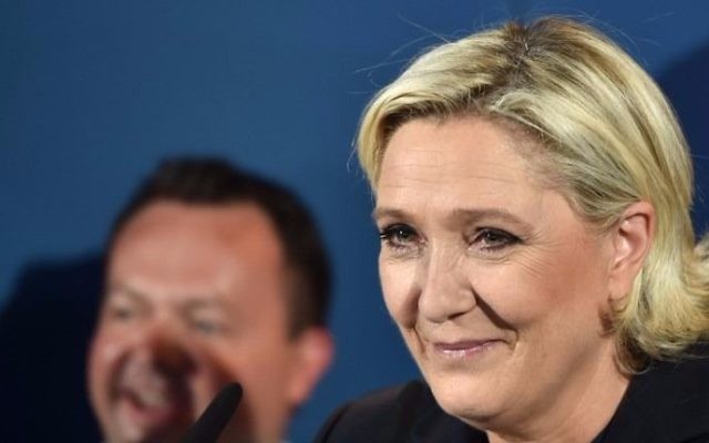 France's far-right National Front (FN) leader and parliamentary candidate Marine Le Pen speaks (C) after the polls closed during the second round of the French parliamentary elections (elections legislatives in French) on June 18, 2017 in Henin-Beaumont, northern France. (Denis Charlet/AFP) France's far-right National Front (FN) leader and parliamentary candidate Marine Le Pen speaks (C) after the polls closed during the second round of the French parliamentary elections (elections legislatives in French) on June 18, 2017 in Henin-Beaumont, northern France. (Denis Charlet/AFP)